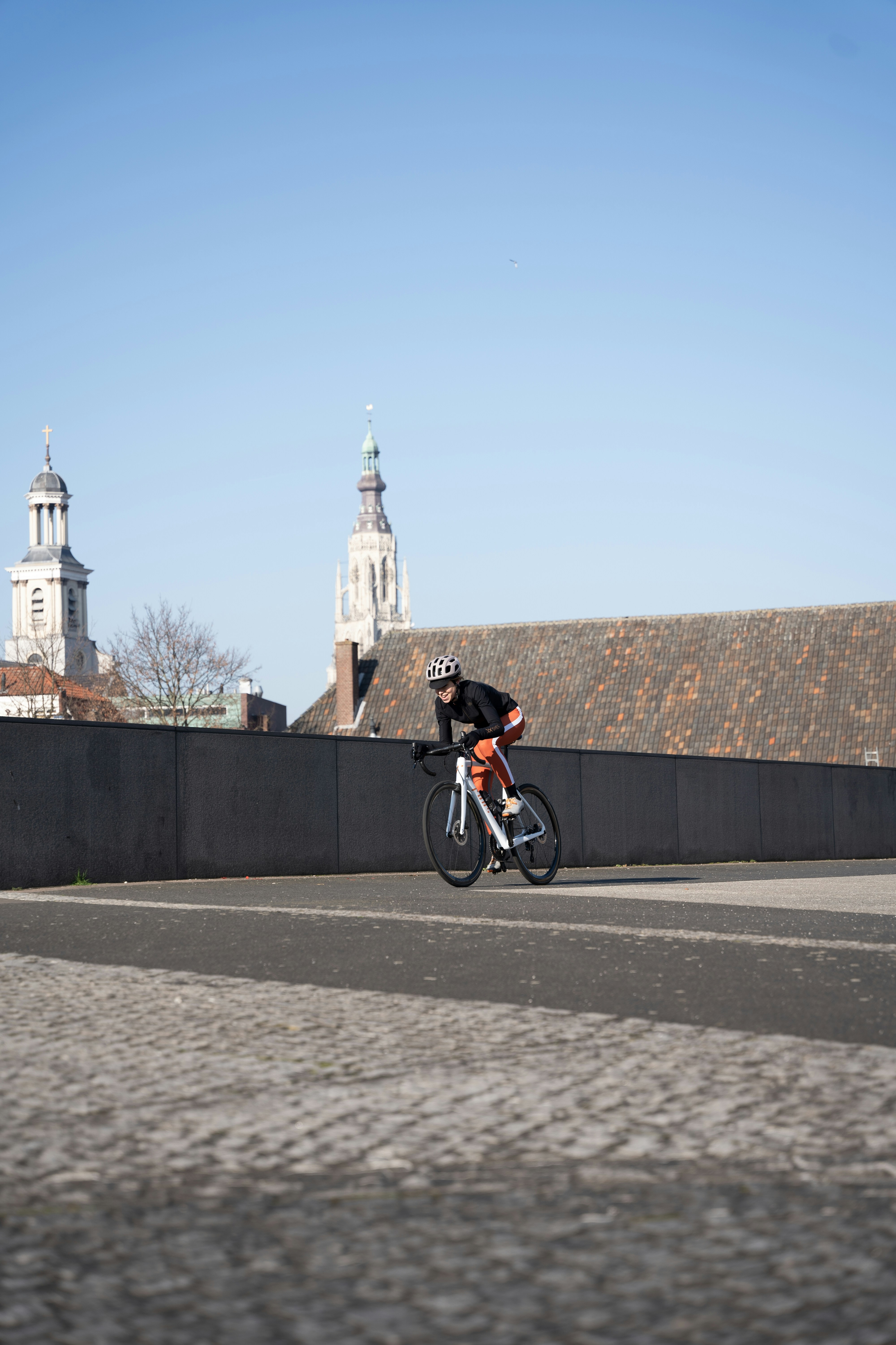A person riding a bike on a city street