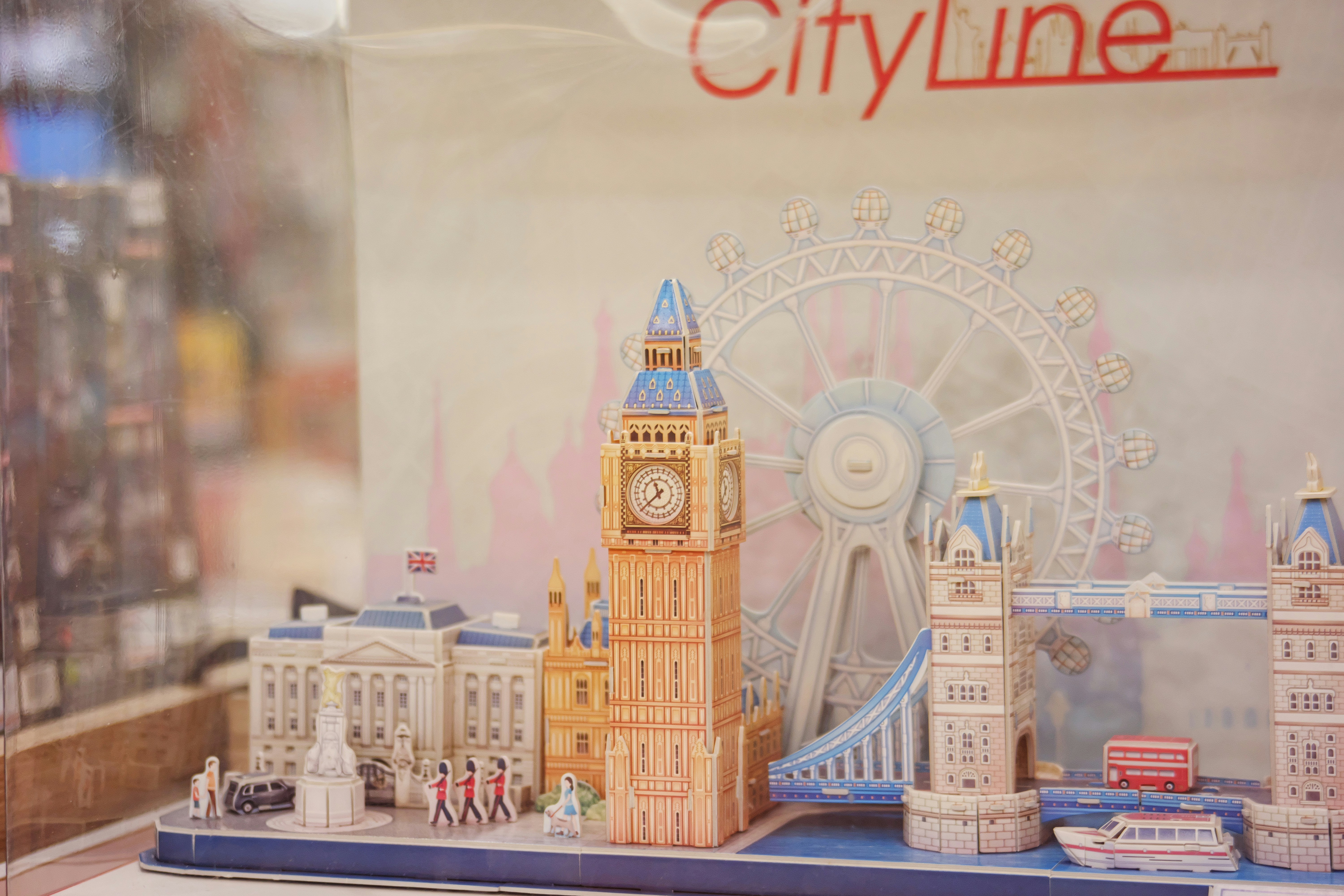 A picture of a city with a ferris wheel