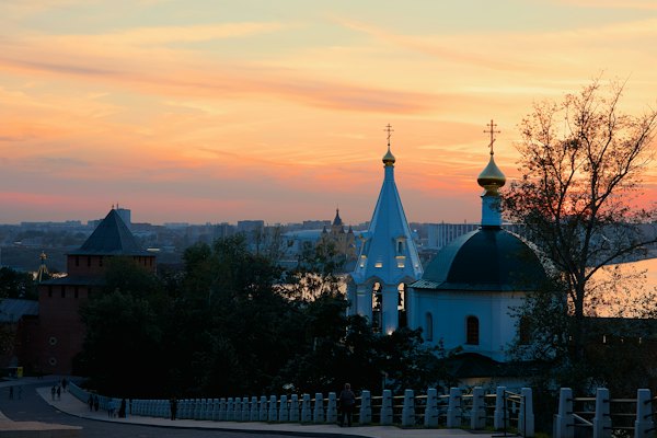Church domes beside the kremlin at dusk — Veliky Novgorod, Russia