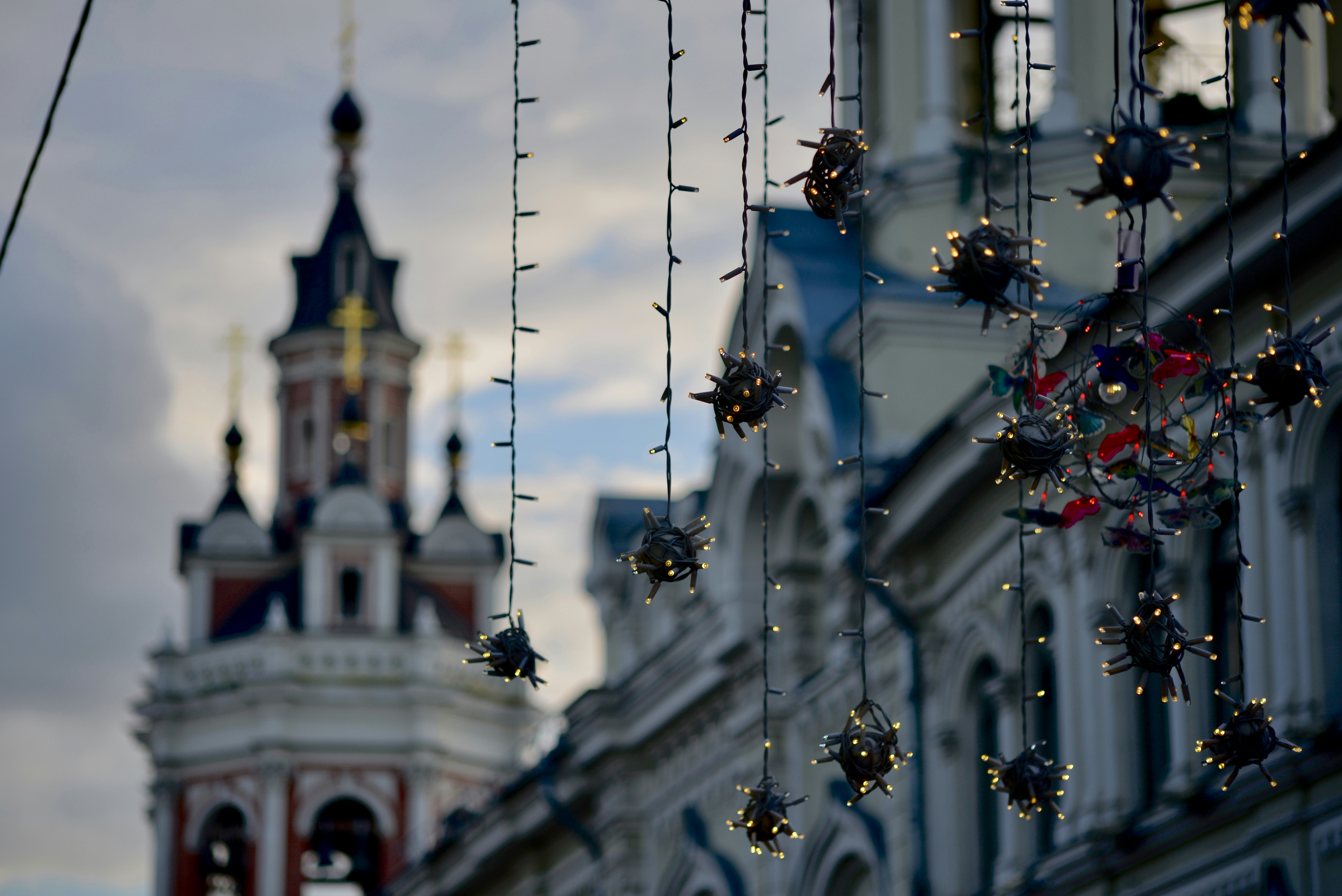 A large building with a clock tower in the background