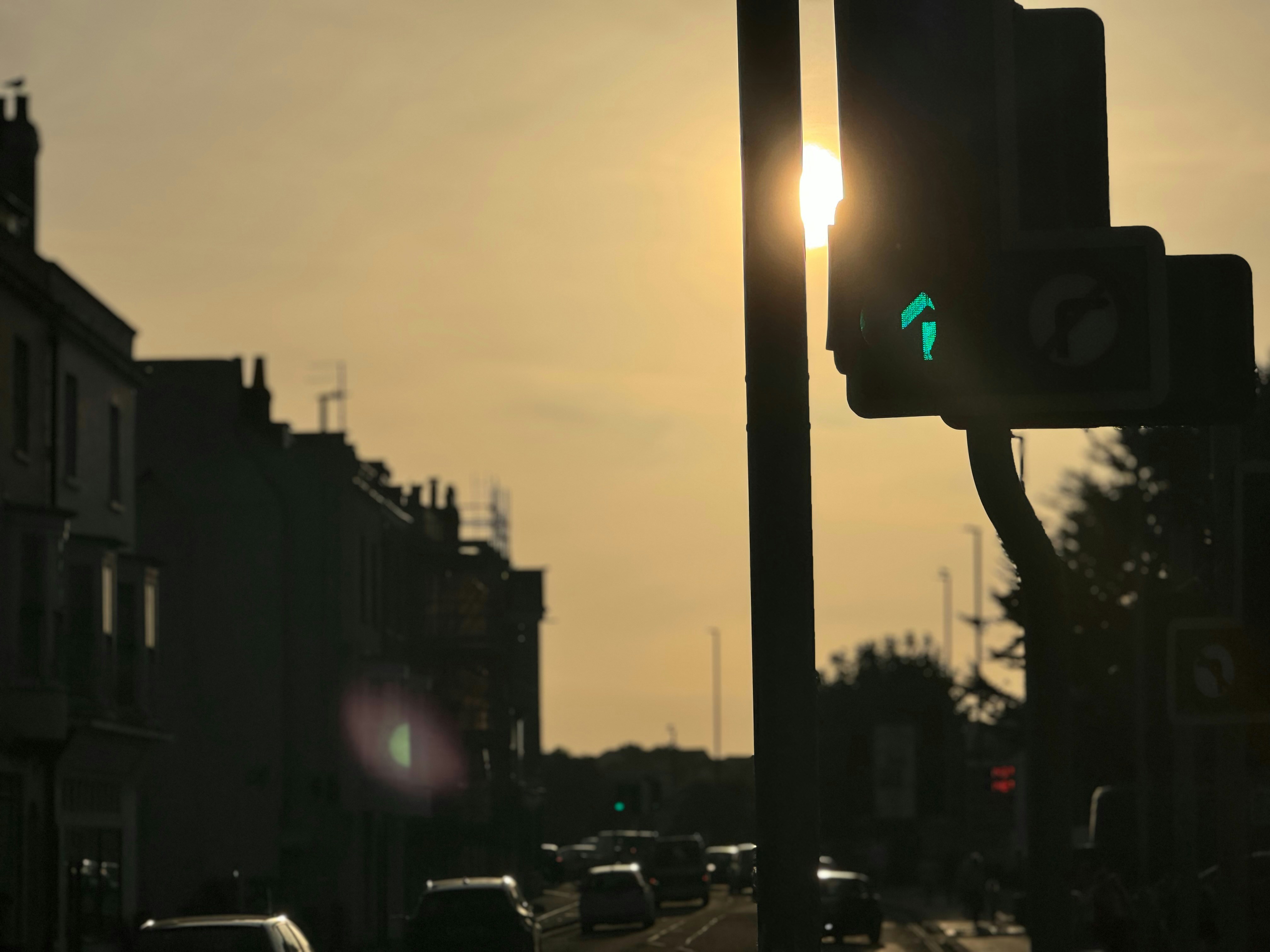 A traffic light sitting on the side of a road