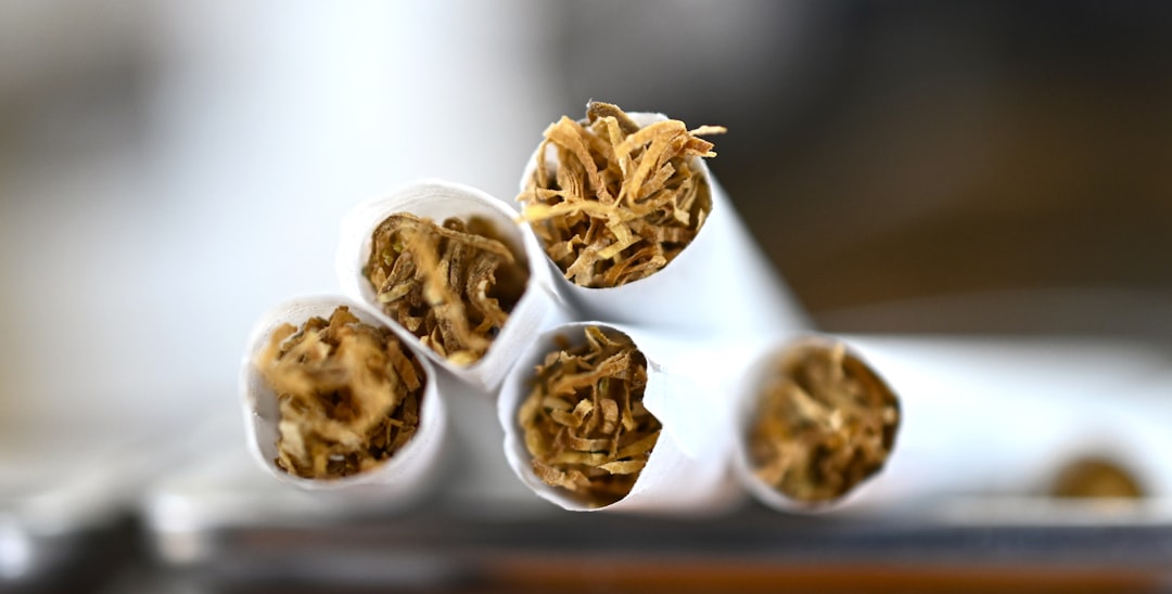 A group of cigarettes sitting on top of a table, cigarettes