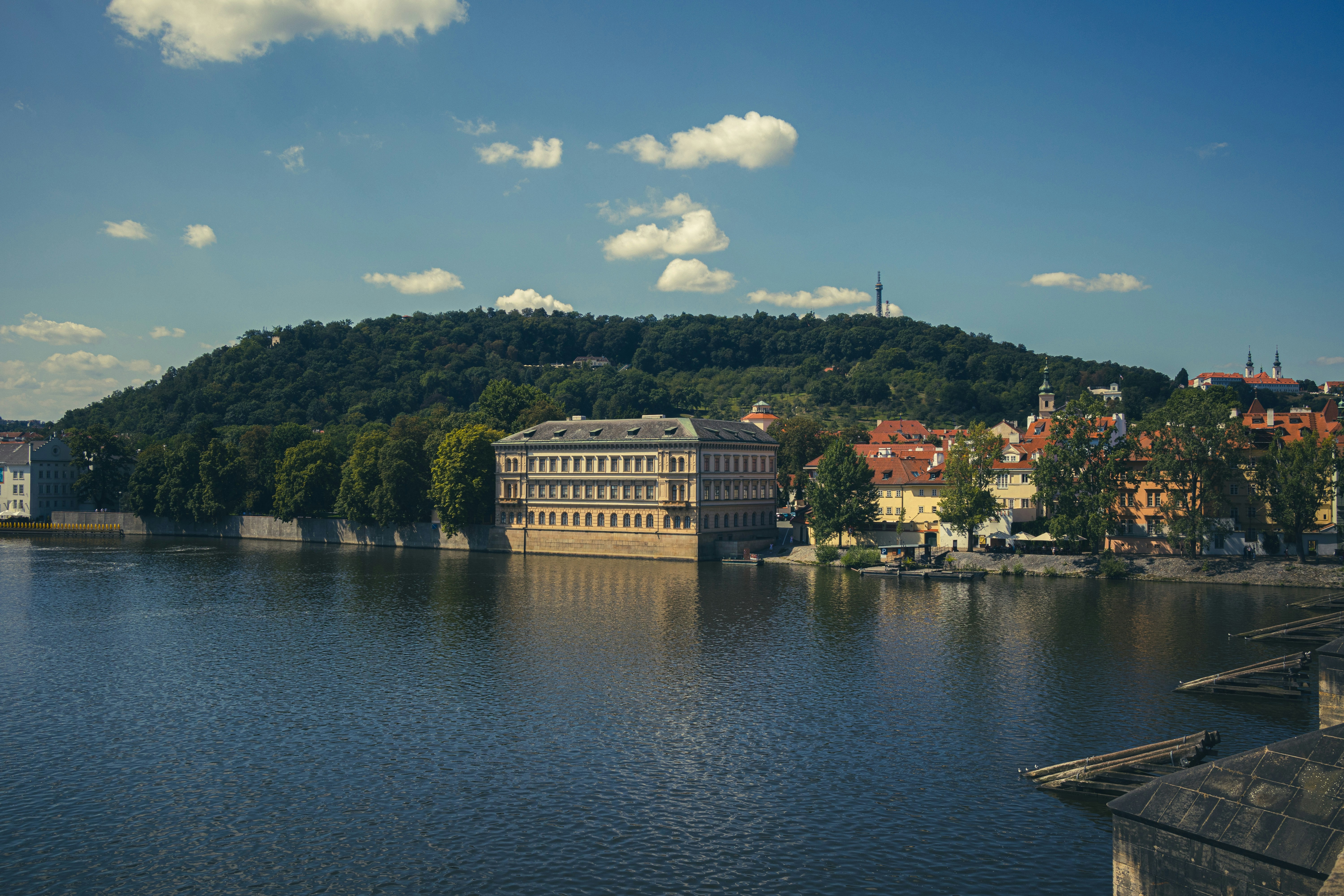 A large body of water surrounded by a city