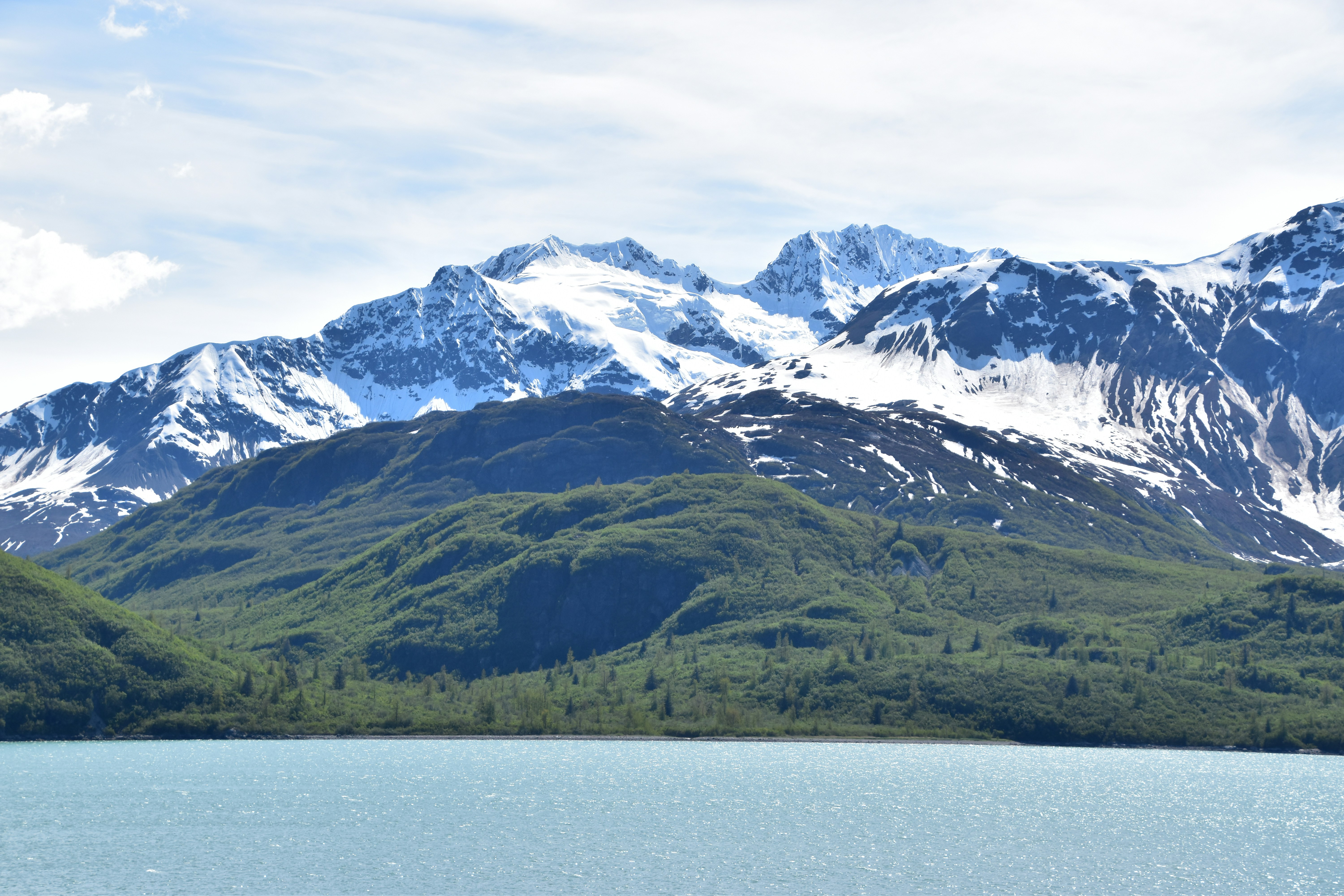A large body of water surrounded by mountains