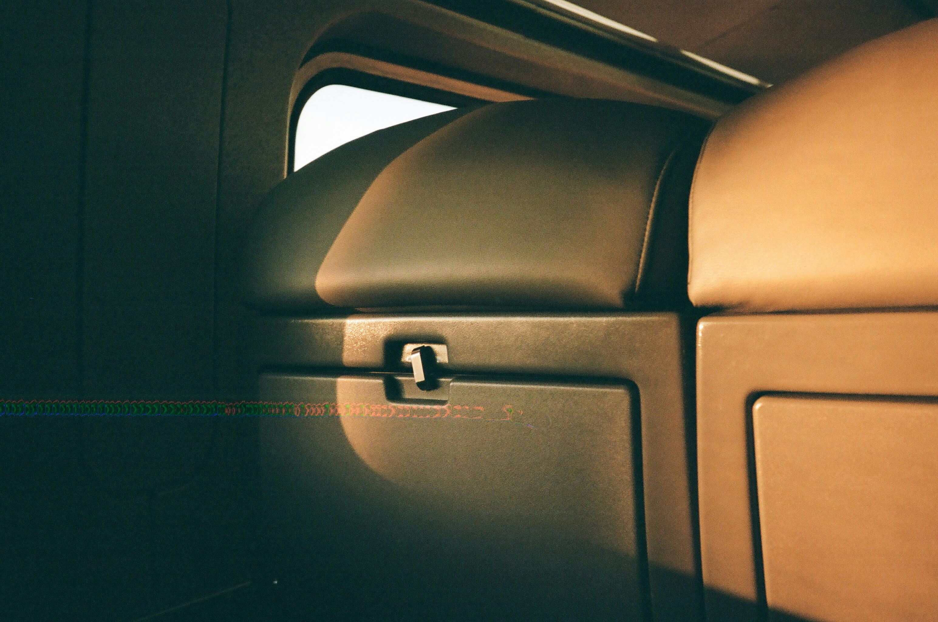 Luxurious interior of a modern electric SUV with large central touchscreen and ambient lighting similar to the Mercedes EQE 350 SUV