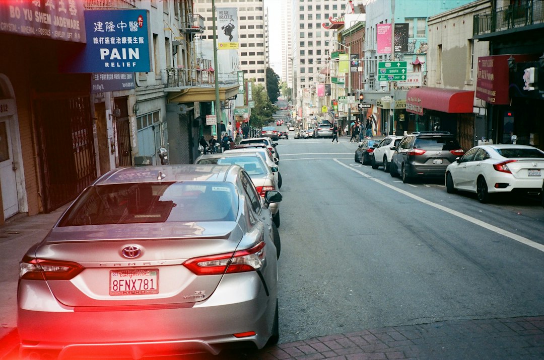 Professional services | Car Wreck Doctor A city street filled with lots of traffic next to tall buildings