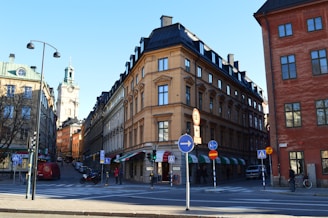 A city street with a lot of tall buildings