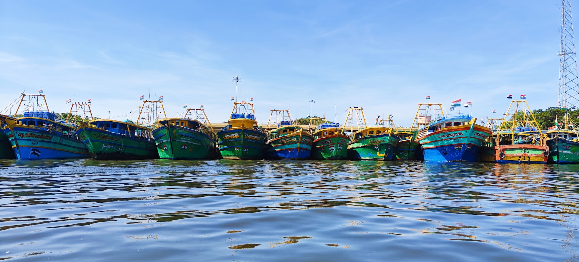A bunch of boats that are sitting in the water