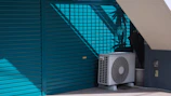 A air conditioner sitting outside of a building