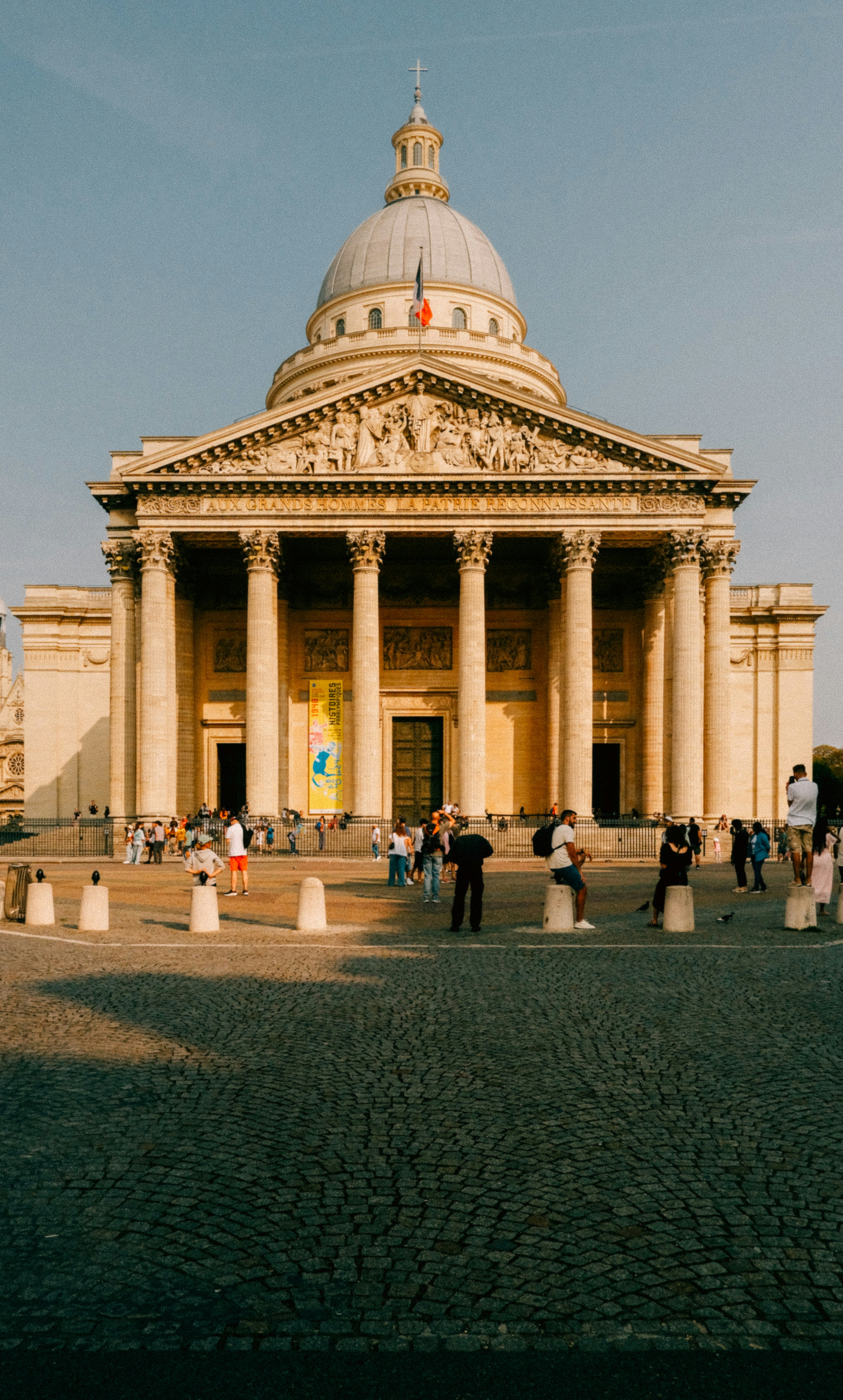 A group of people standing in front of a building