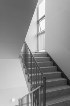 A black and white photo of a staircase