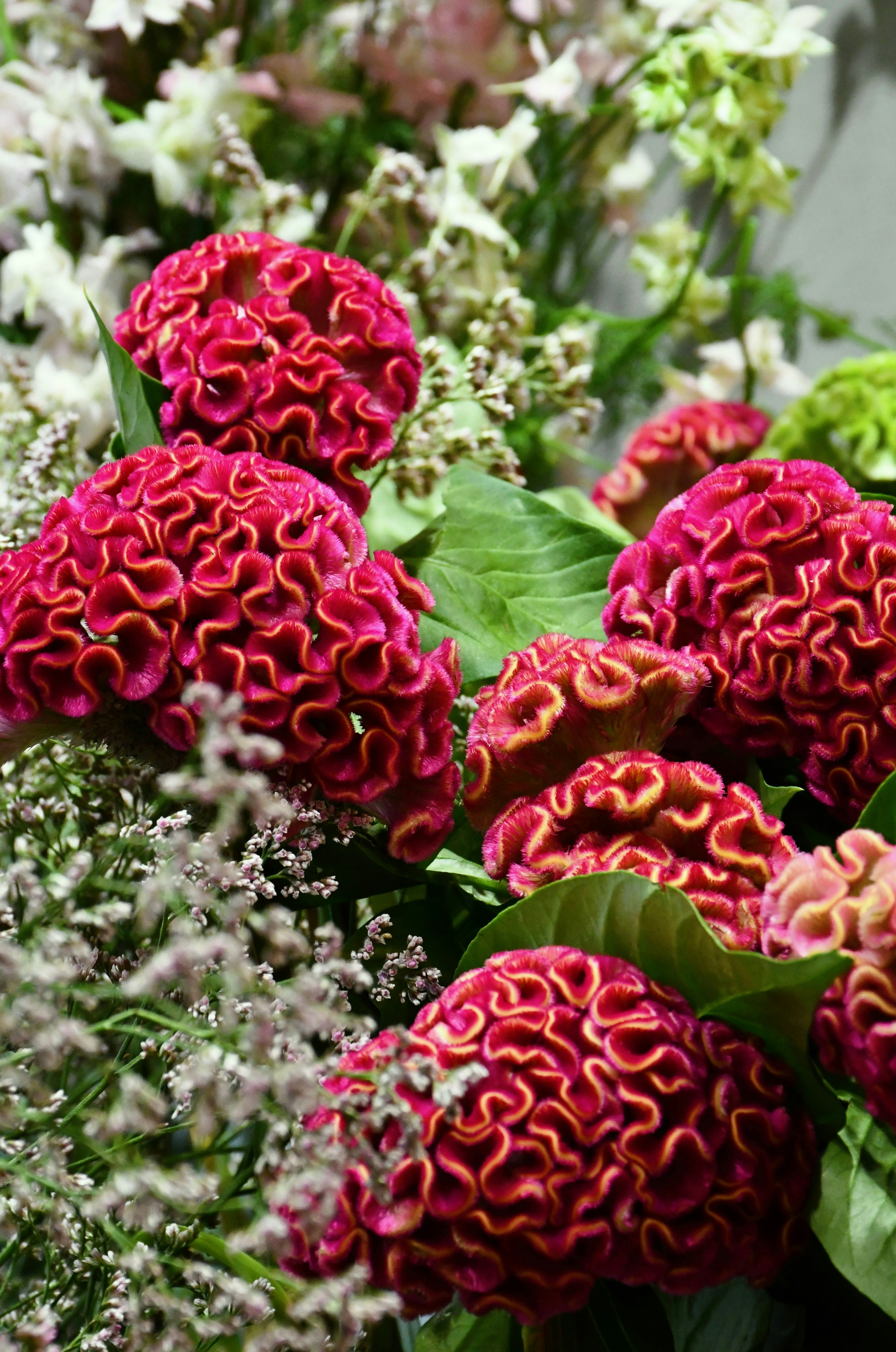 A bunch of flowers that are in a vase