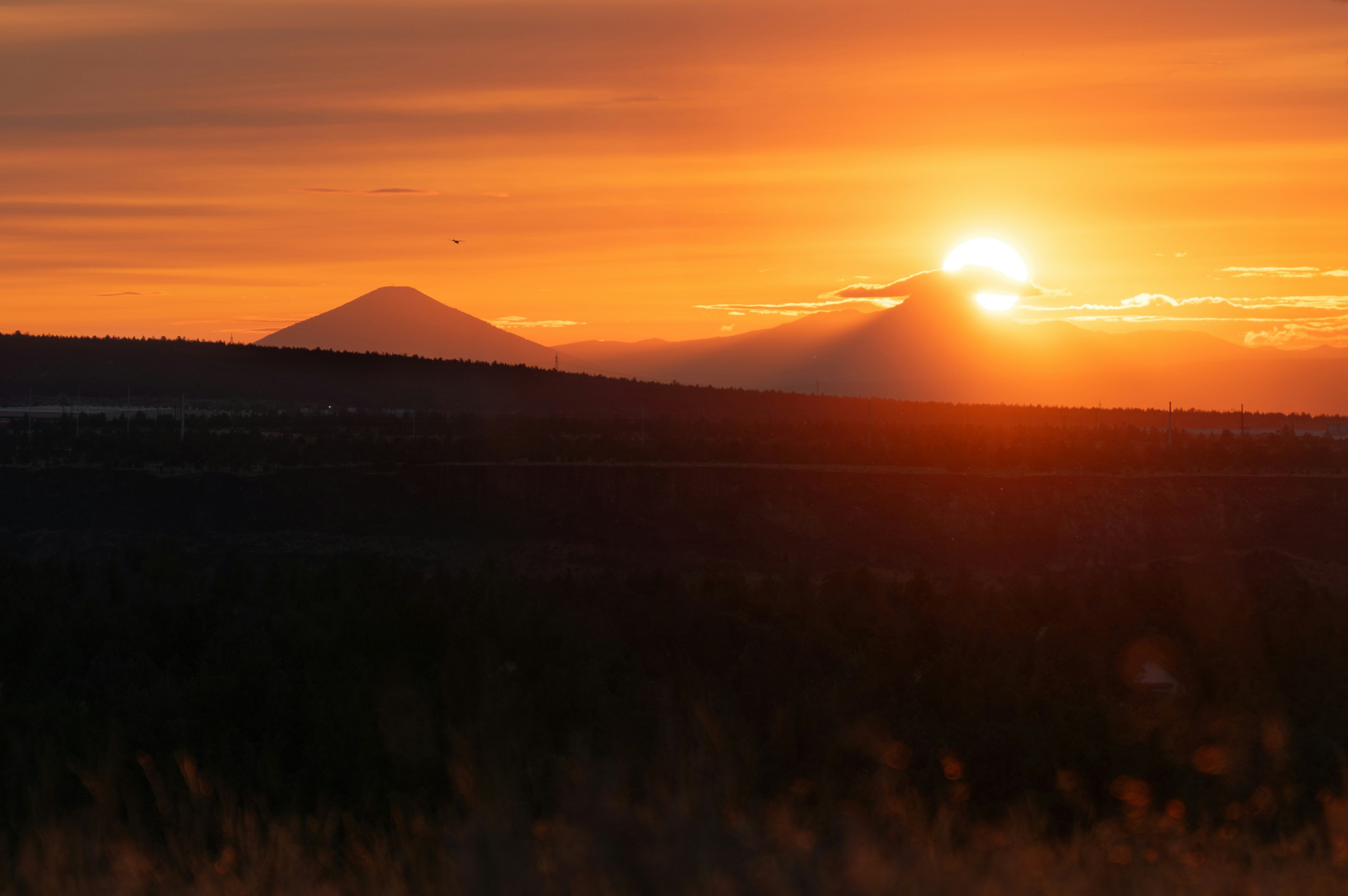 Minecraft landscape with mountains at sunset