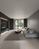 A living room with a couch and a table