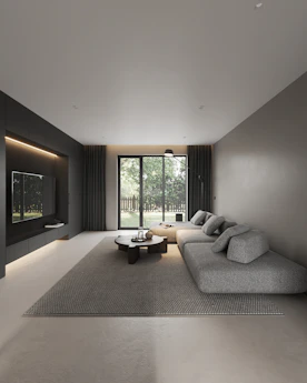 A living room with a couch and a table