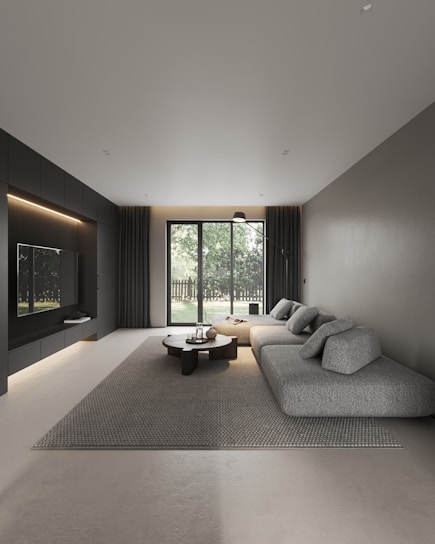 A living room with a couch and a table