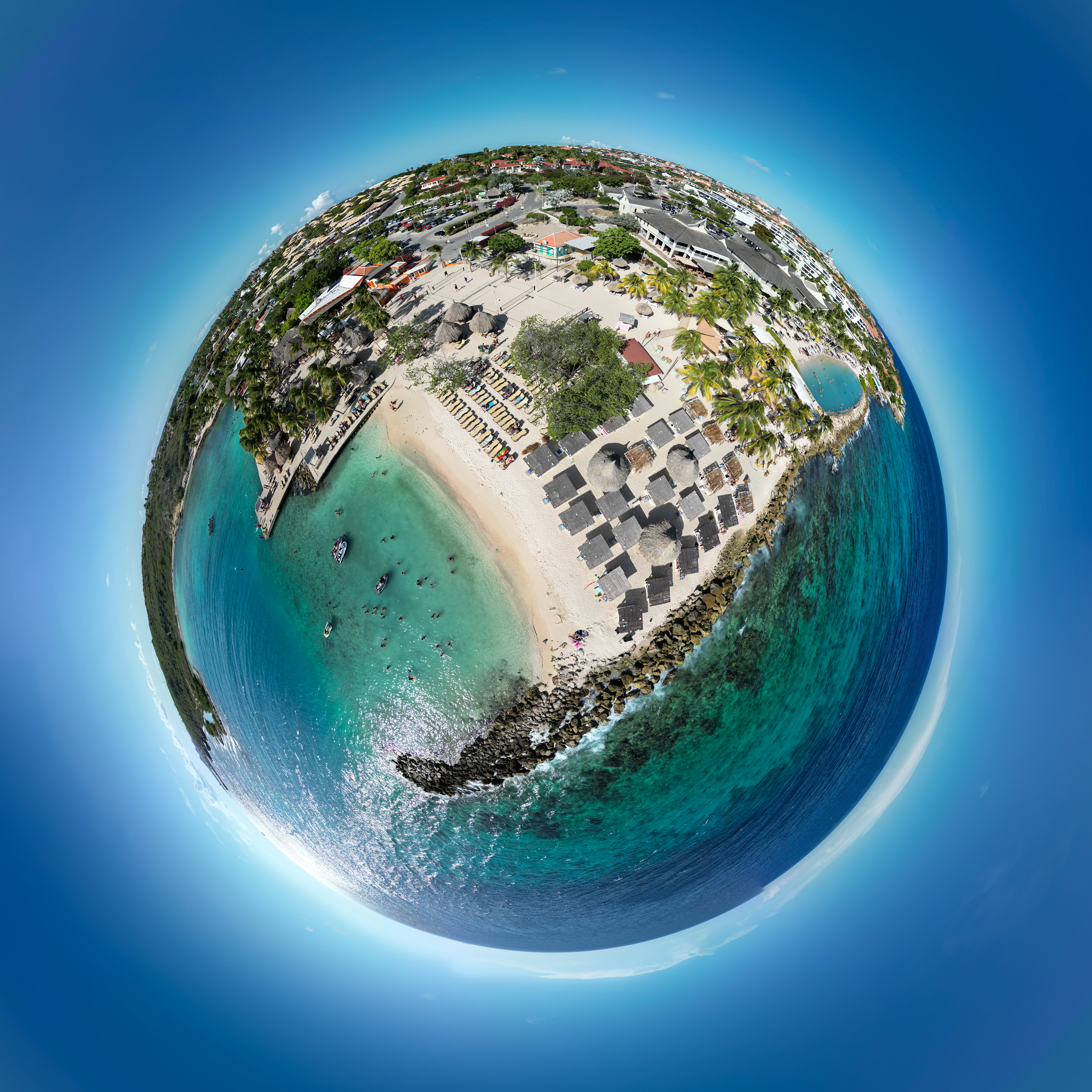 An aerial view of a beach and a resort