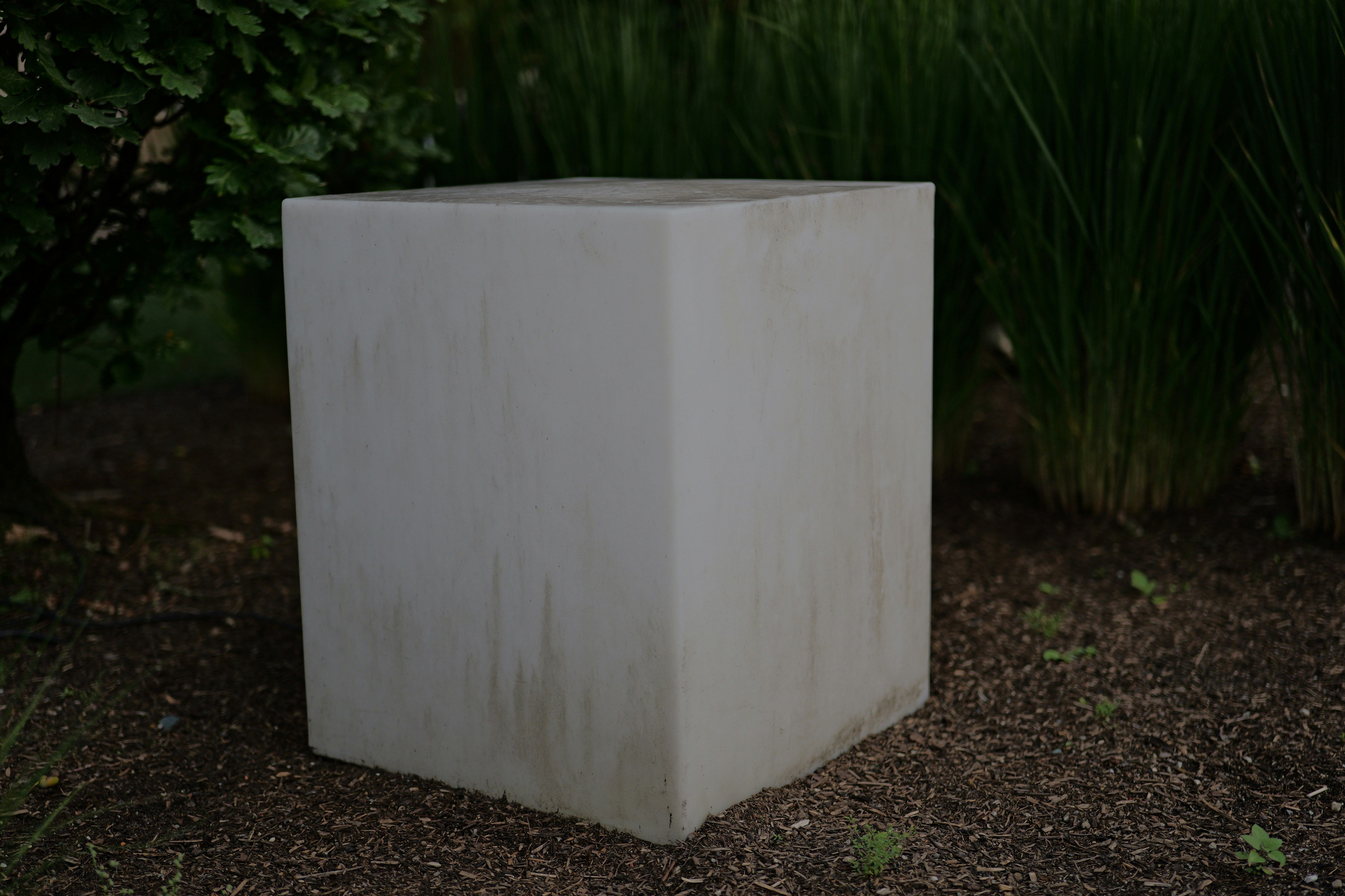 modern minimalist outdoor toilet structure with clean lines - backyard toilet ideas