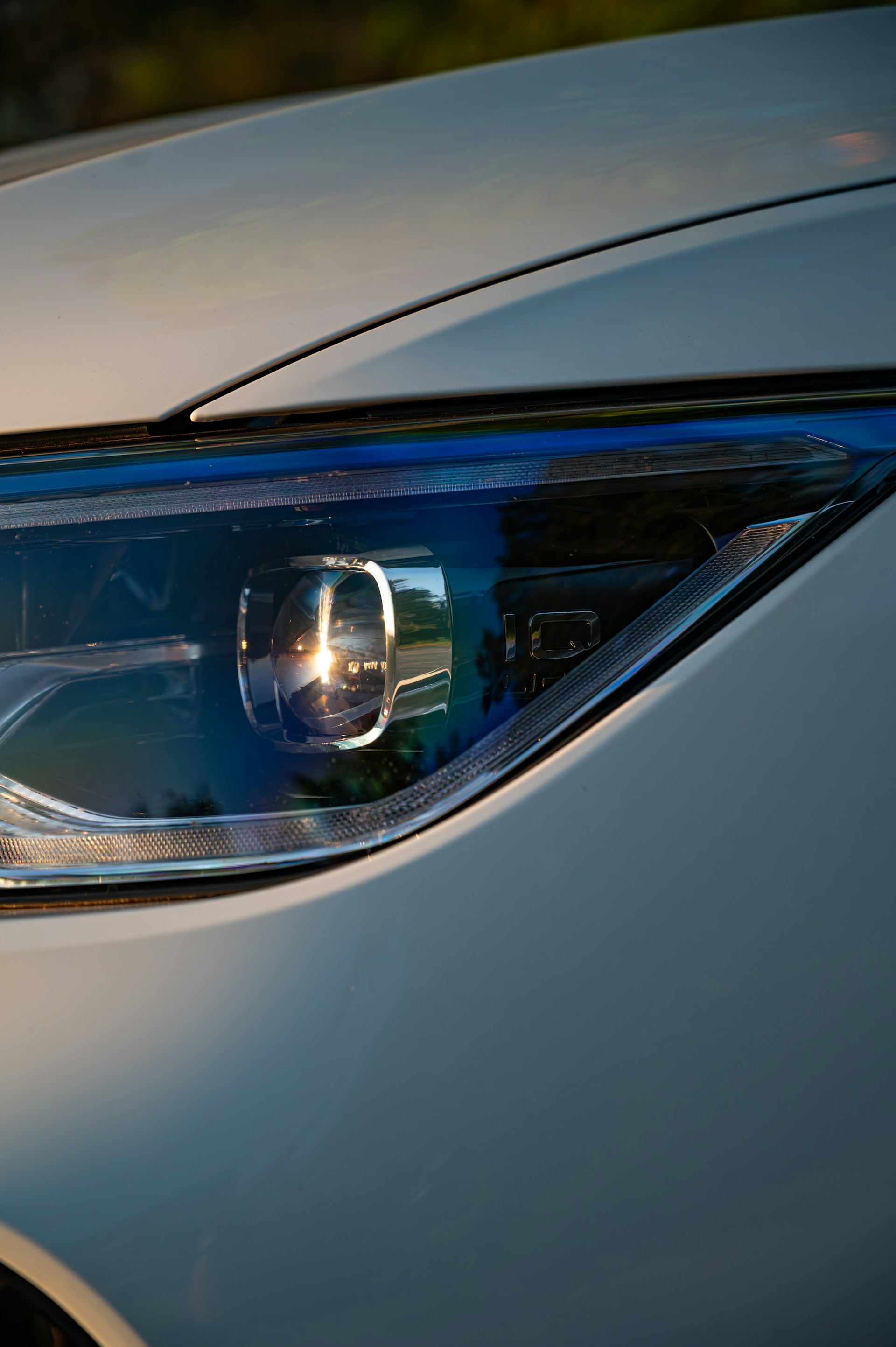 A close up of a headlight on a car