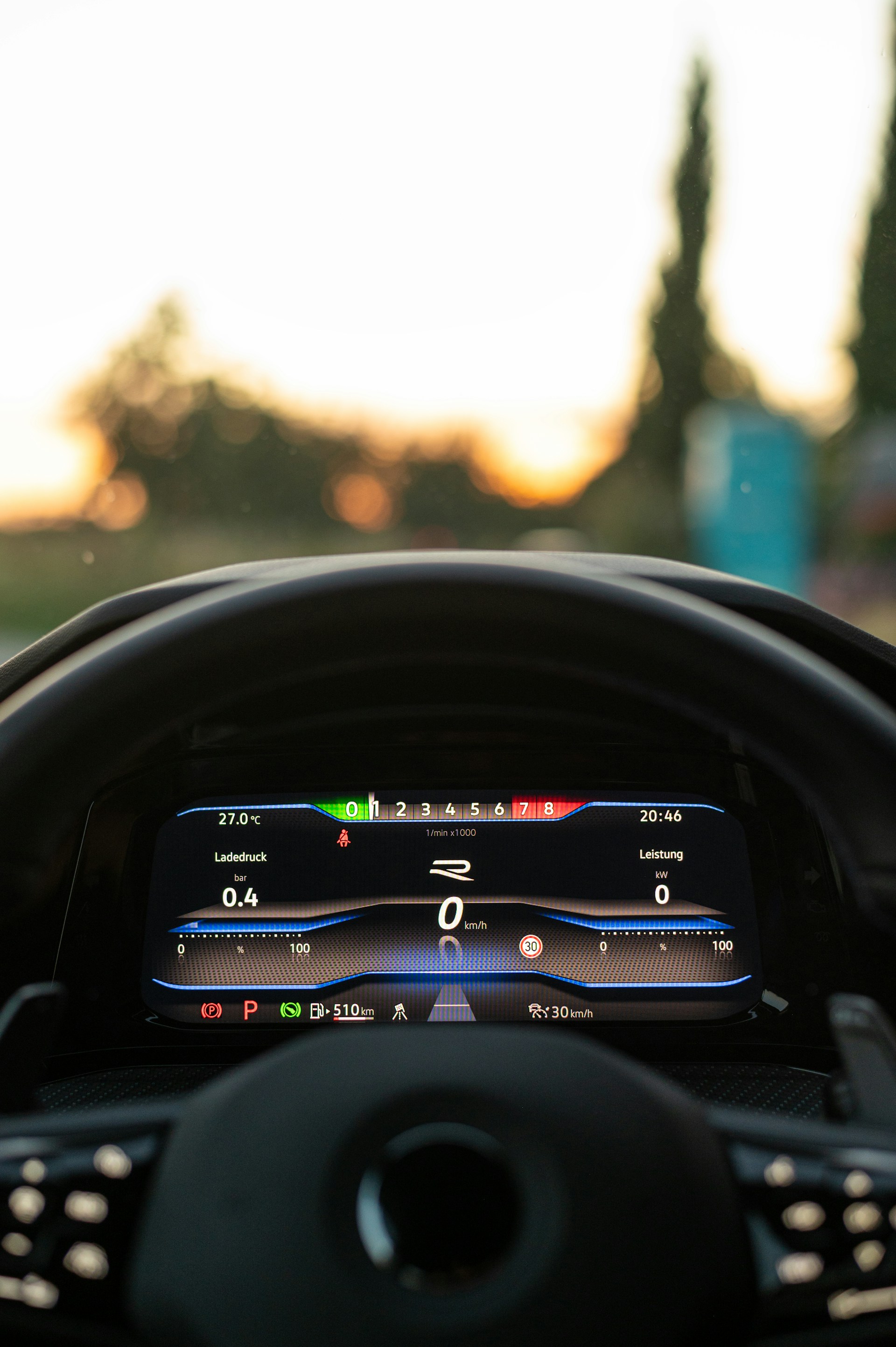 The dashboard of a car with a digital screen