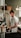 A man standing in a kitchen preparing food