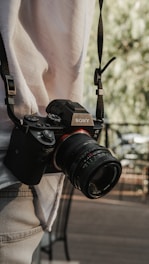 A person holding a camera in their hand