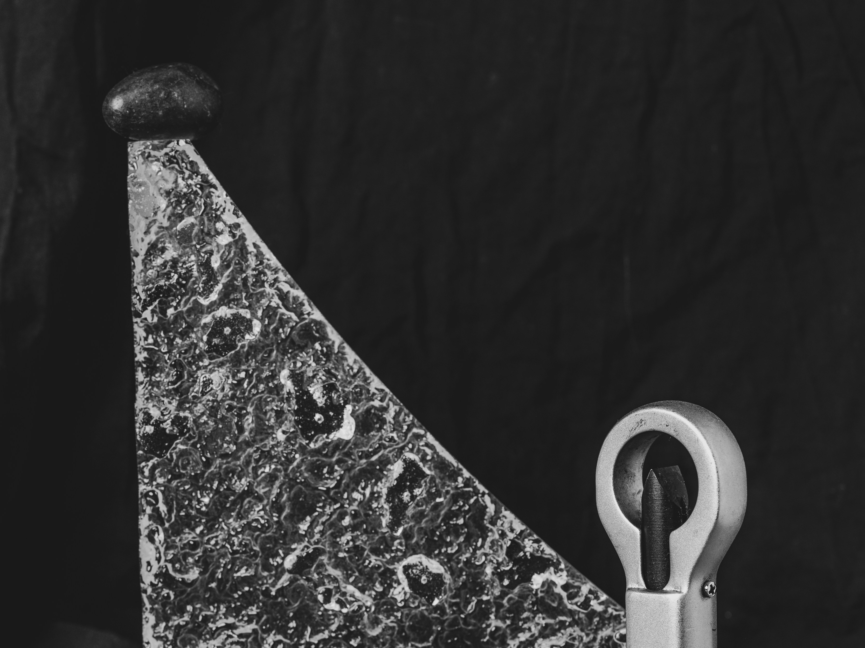 A black and white photo of a pair of scissors