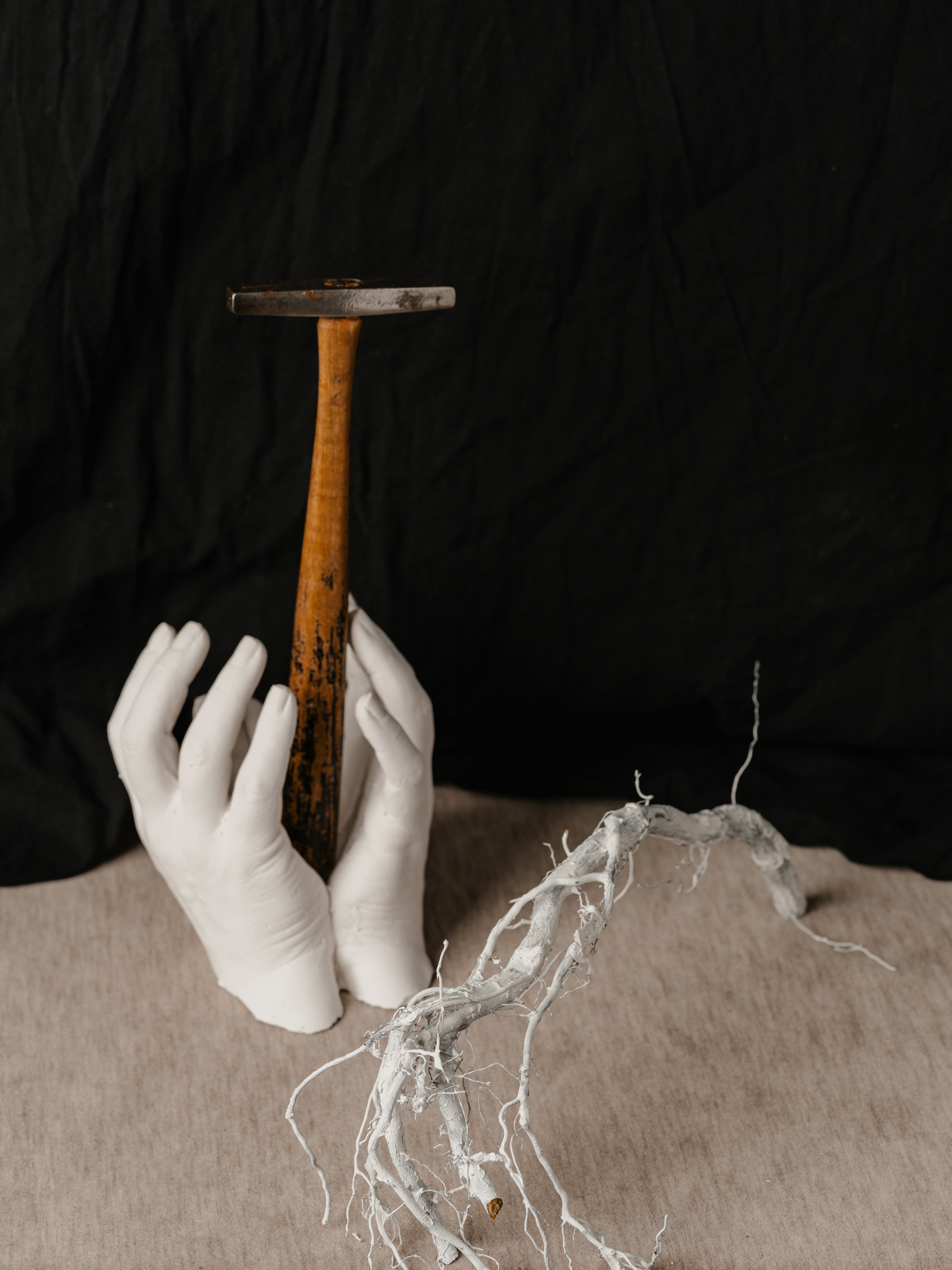 A person holding a large hammer in their hand photo – Free Hand Image ...