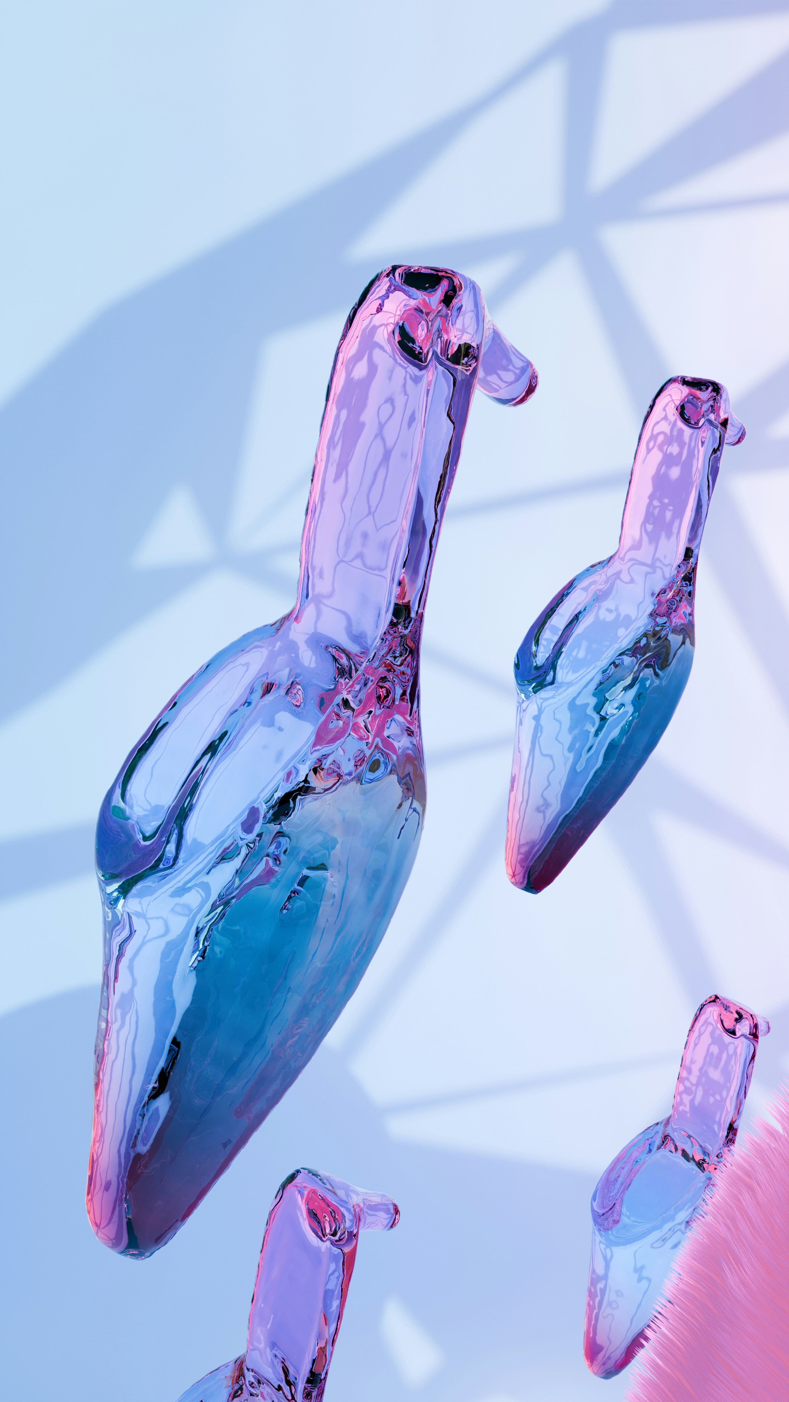 A group of pink and blue objects floating in the air