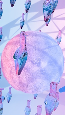 A group of blue and pink objects floating in the air