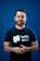 A man with a beard wearing a t - shirt that says ingles devs