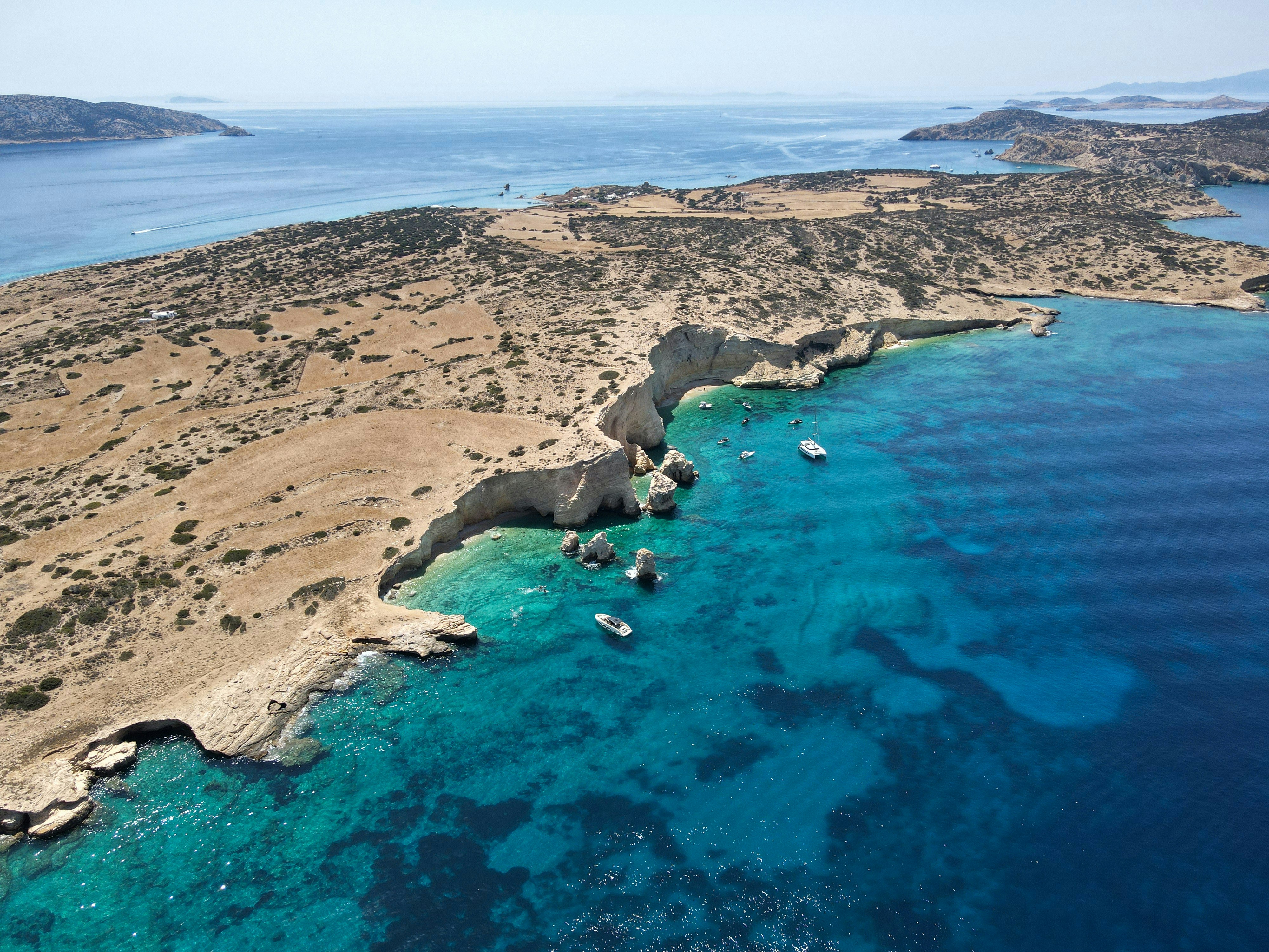 An aerial view of an island in the middle of the ocean