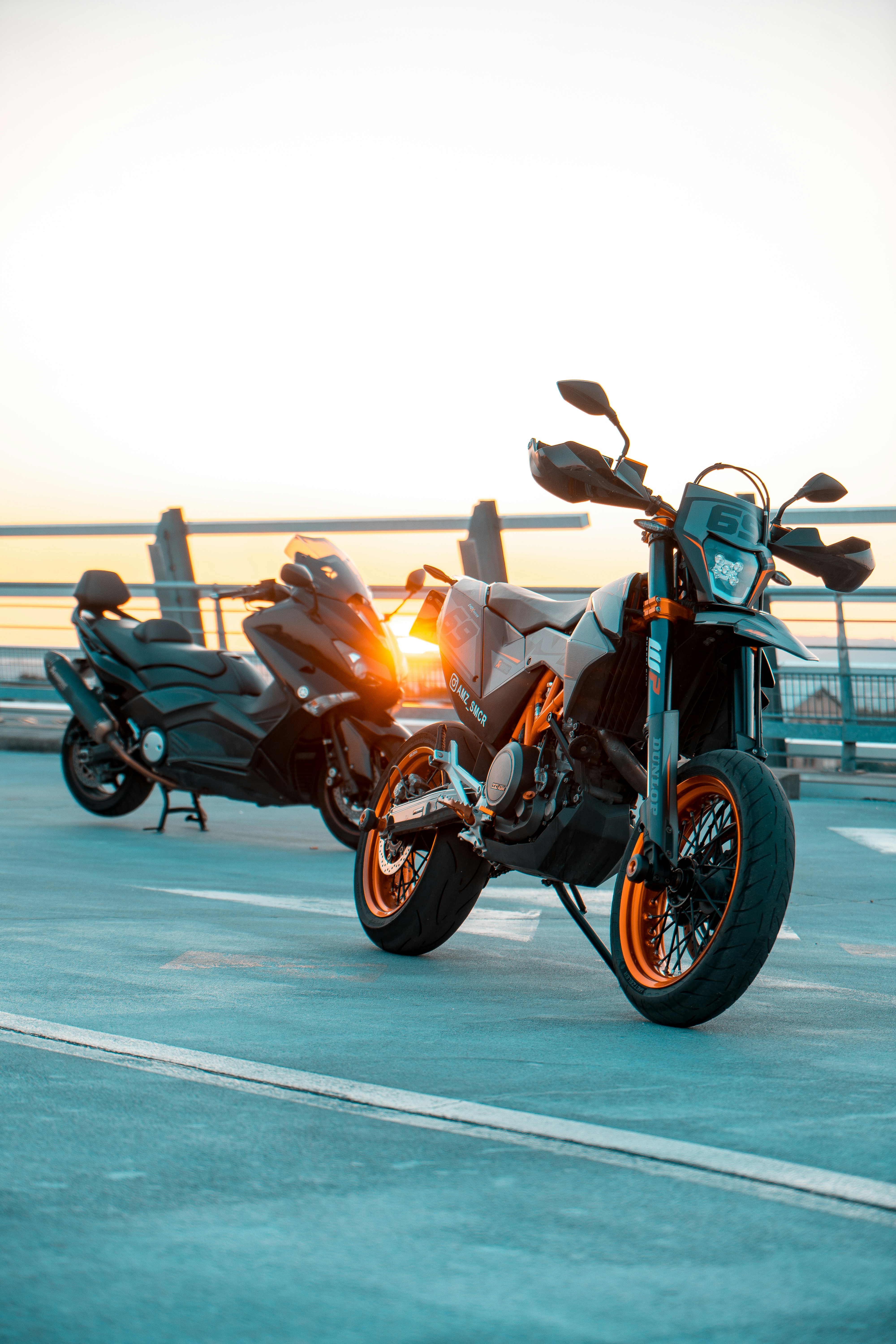 A couple of motorcycles parked next to each other