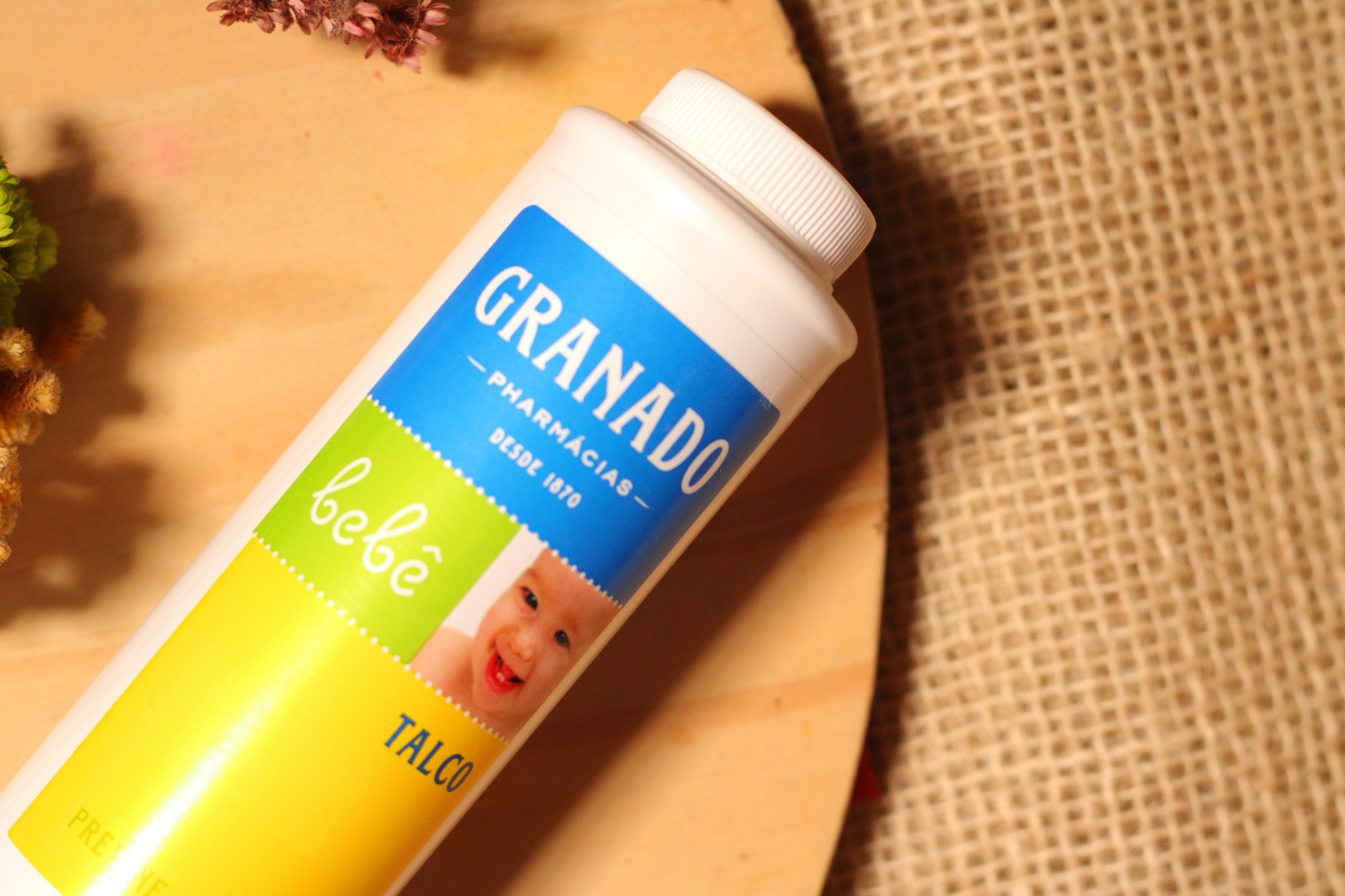 A close up of a bottle of toothpaste on a table