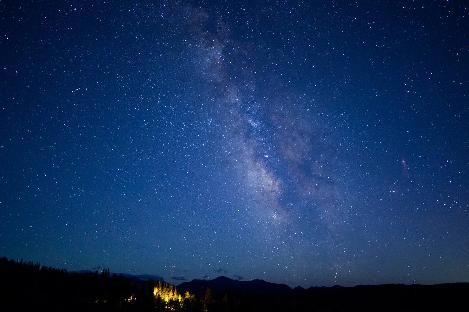 The night sky over still waters
