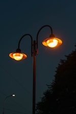 A couple of street lights sitting next to each other