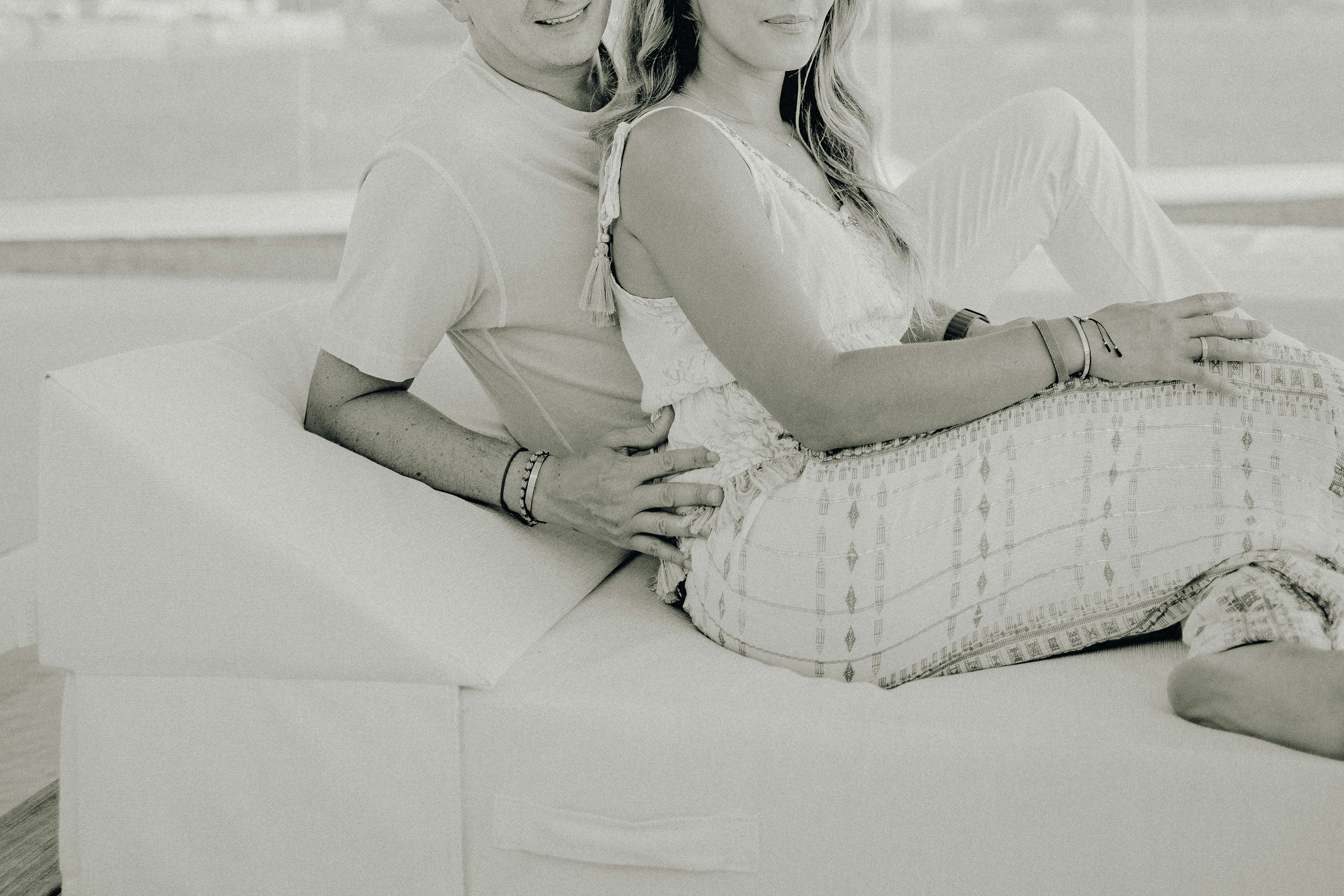 A couple of women sitting next to each other