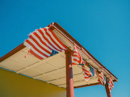 American flag on a rural building