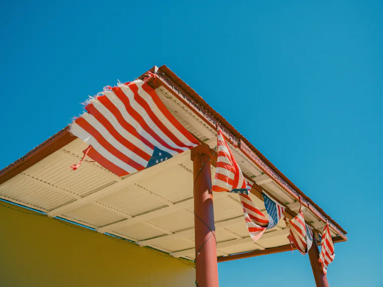 American flag on a rural building