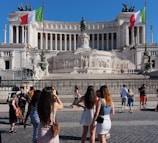 A group of people standing in front of a building
