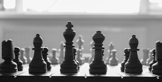 A black and white photo of a chess board