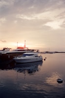 A couple of boats that are sitting in the water