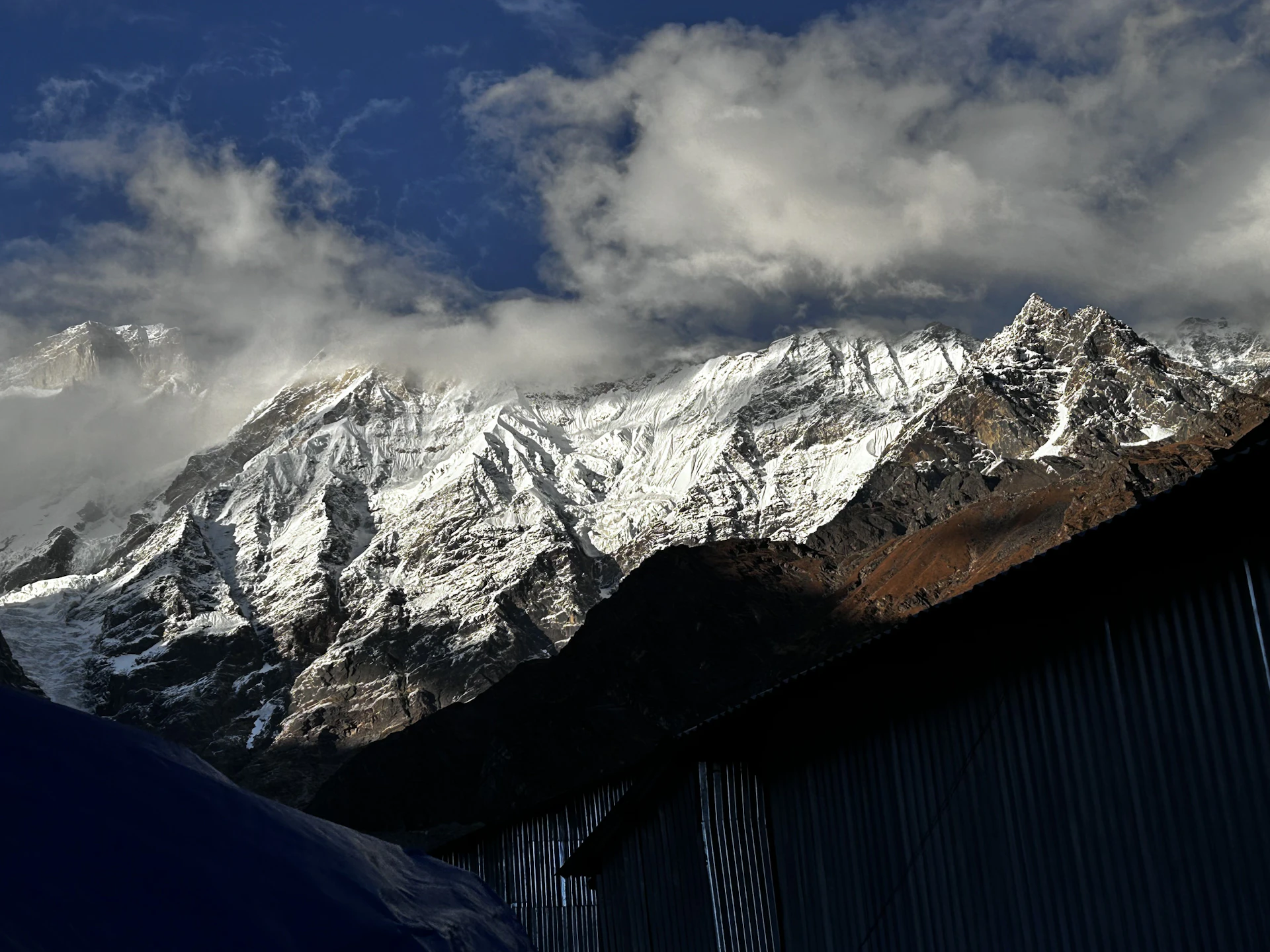 A Himalayan 8,000-metre peak under storm cloud