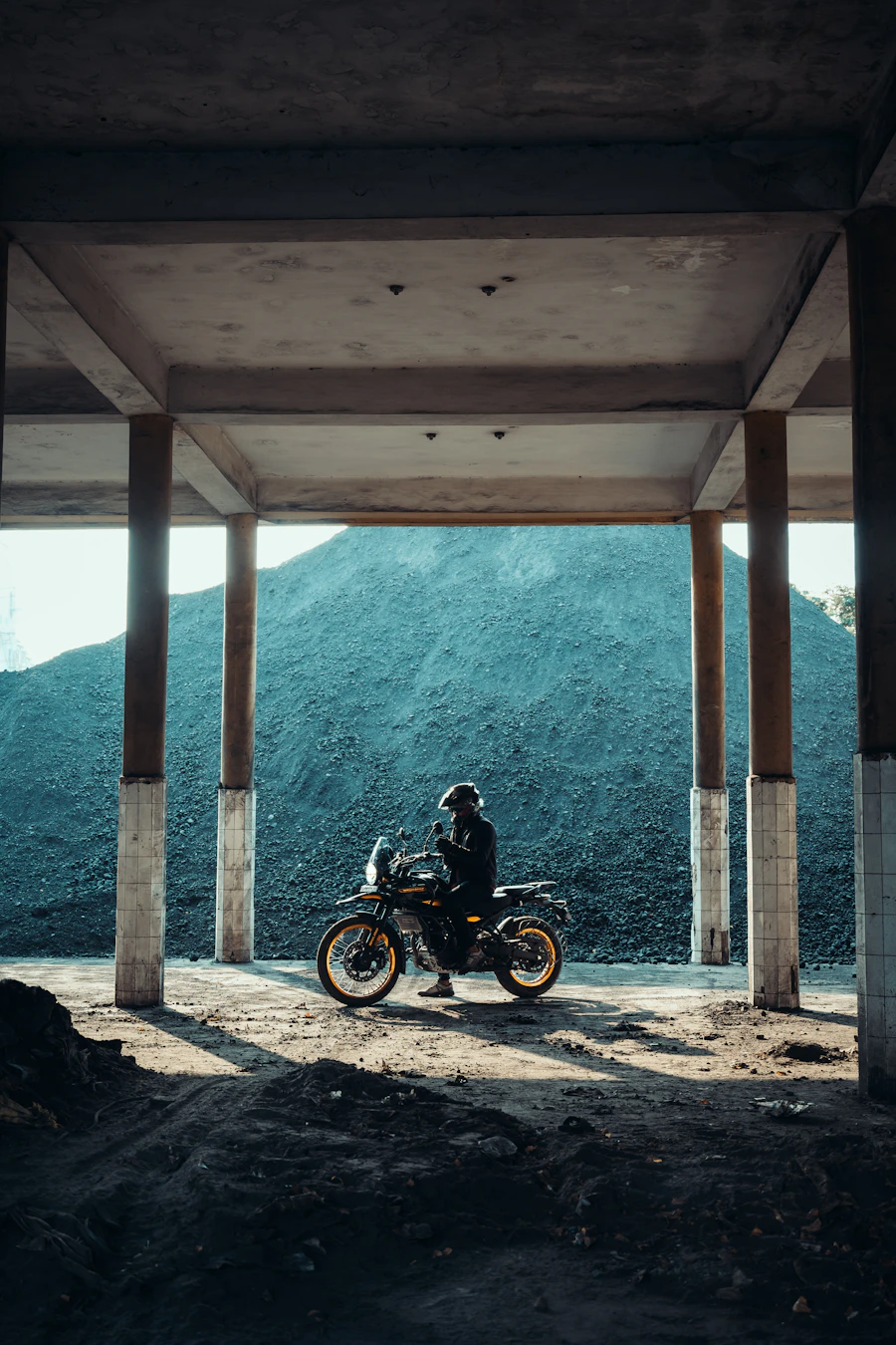 Motorcyclist riding through a mountain pass on the Everest region route in Nepal