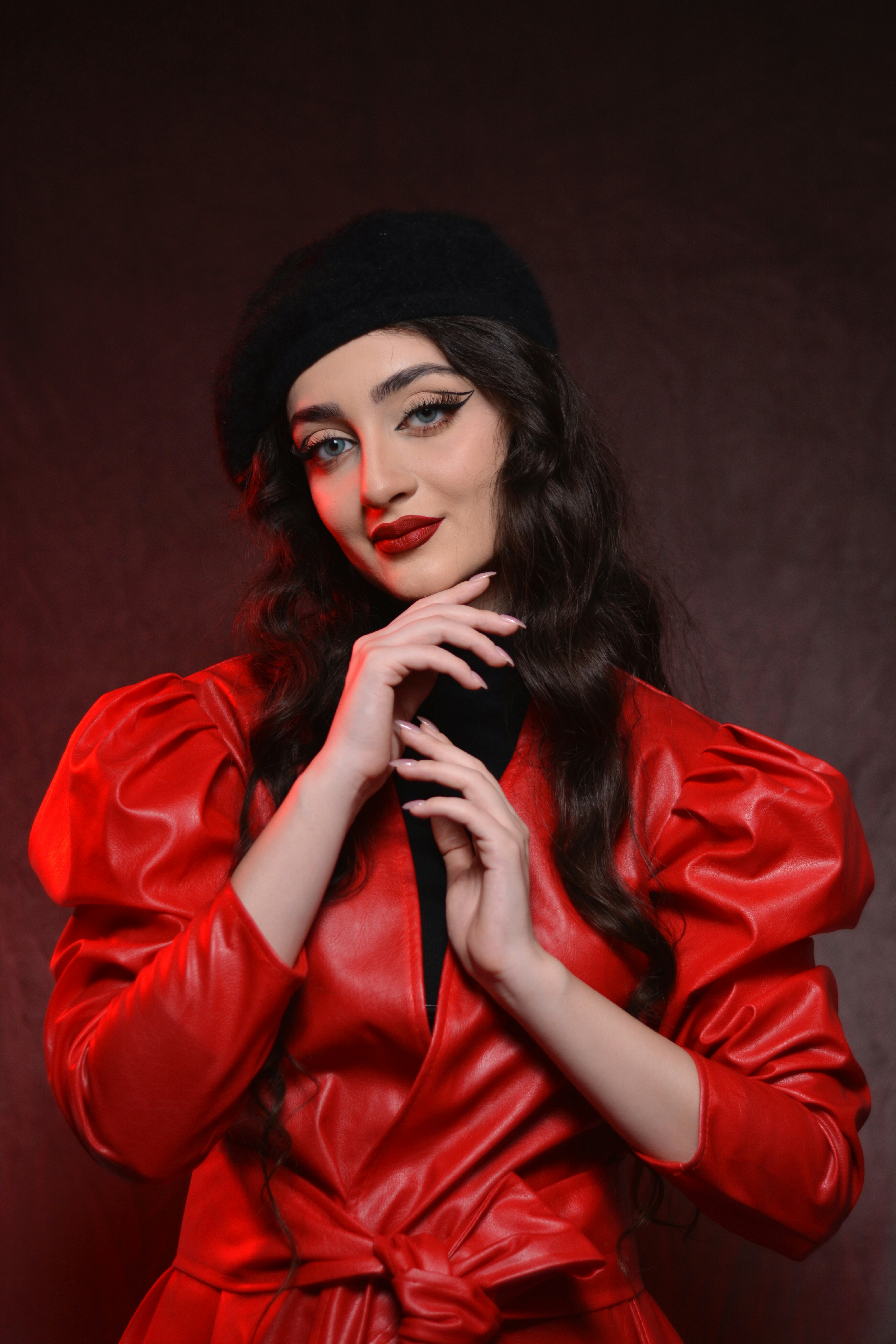 red dress black hat A woman in a red dress and a black hat photo – Free Fashion Image on  Unsplash