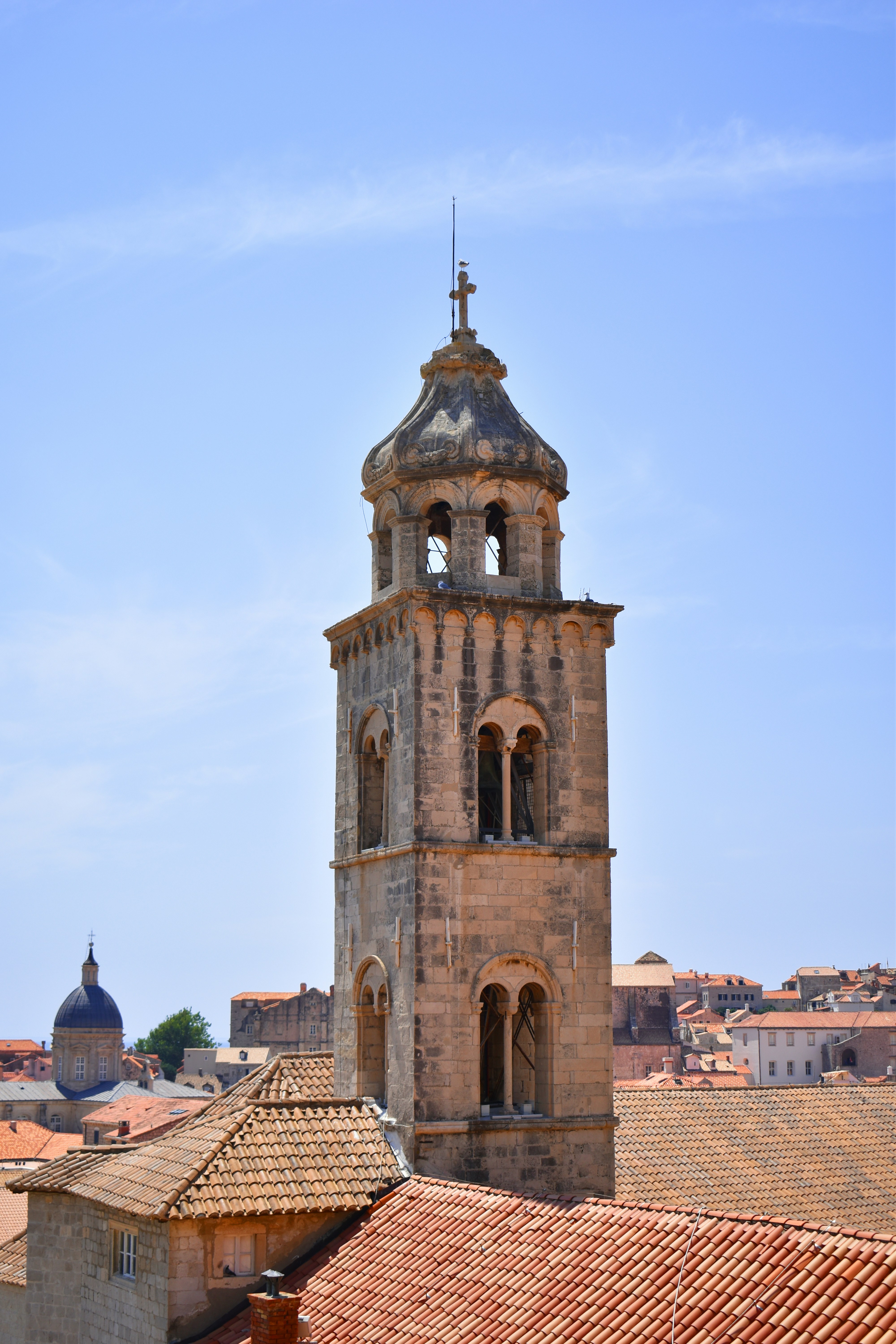A tall tower with a clock on top of it