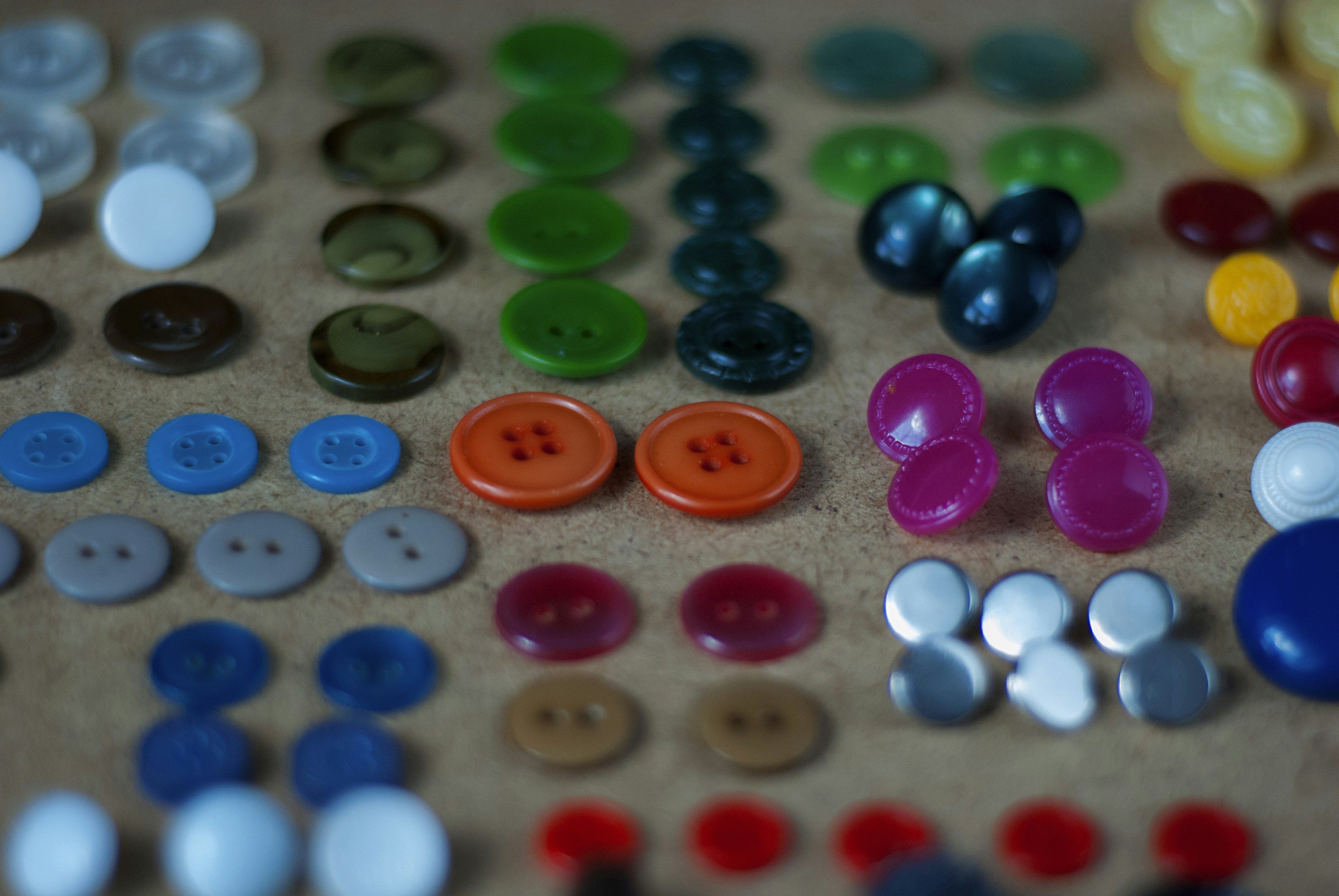 A close up of a bunch of buttons on a table
