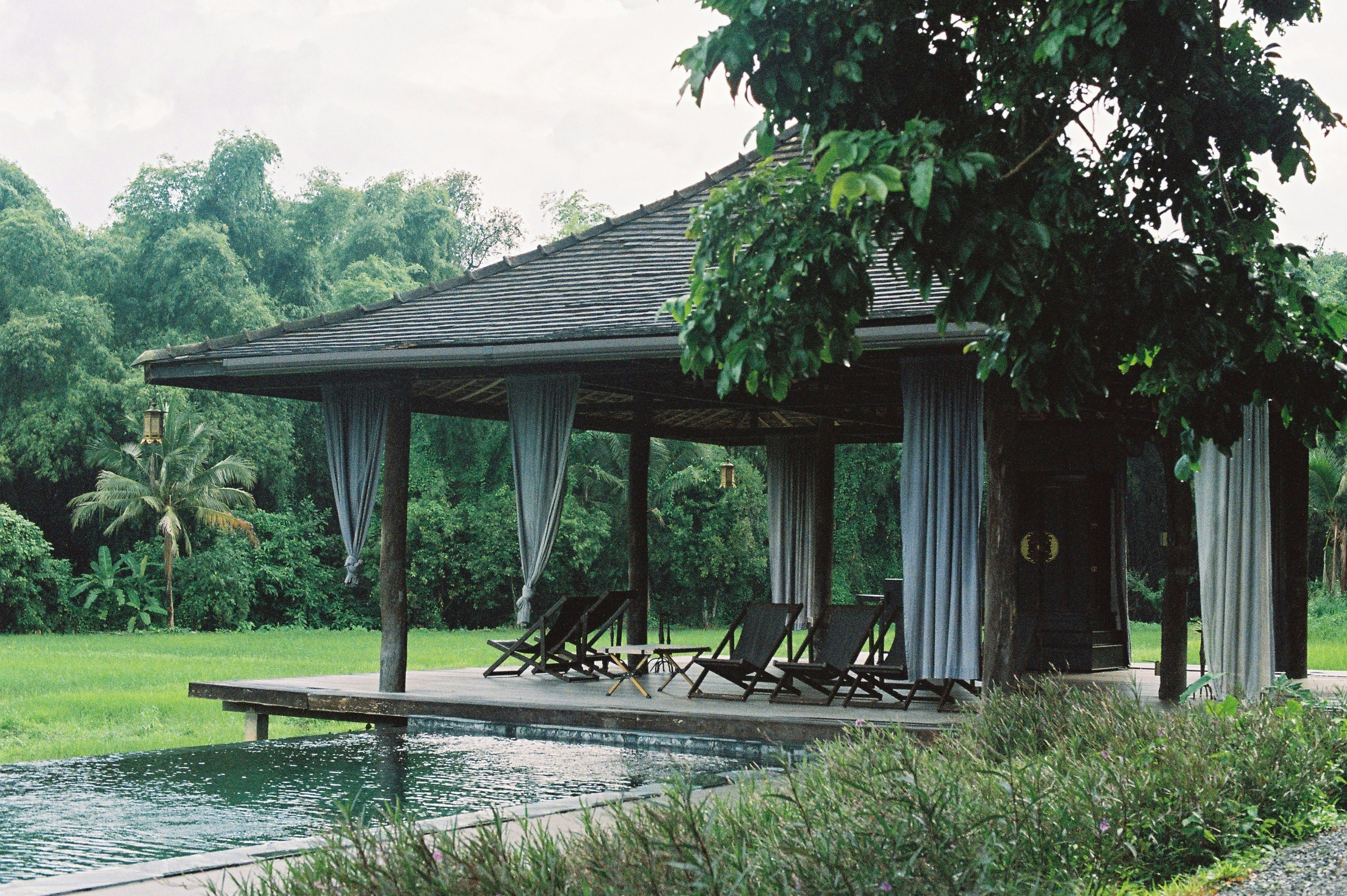 A gazebo sitting next to a body of water