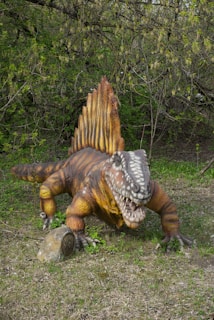 A statue of a dinosaur laying on its back