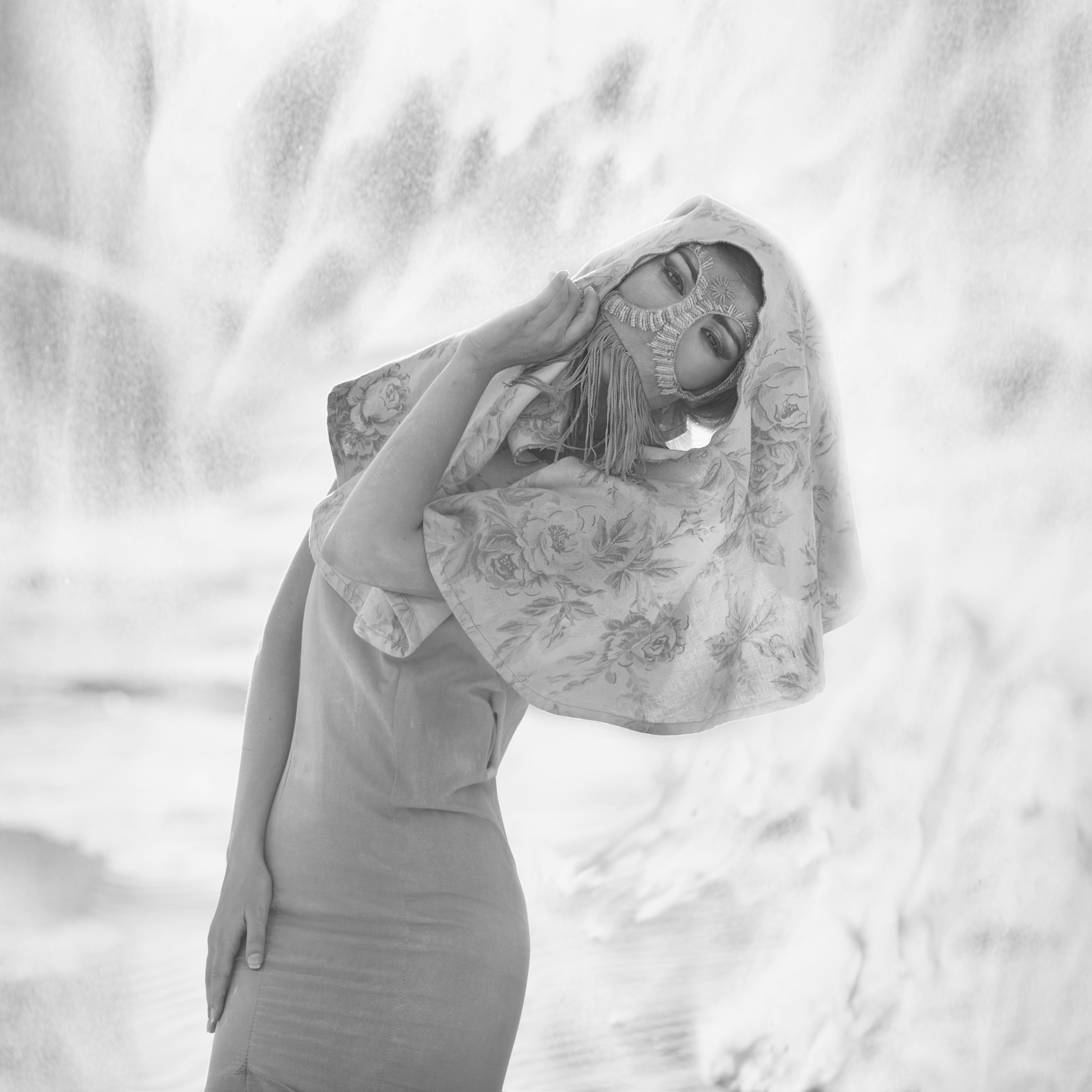 A woman standing in front of a waterfall photo – Free Portrait Image on ...